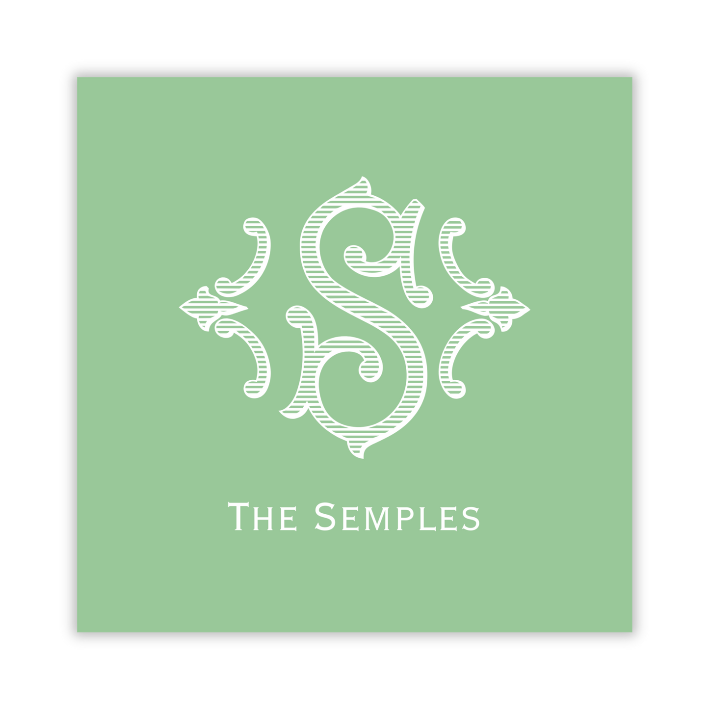 green gift tag with romanesque single initial; ShooFly Paper Co. Auburn, Alabama
