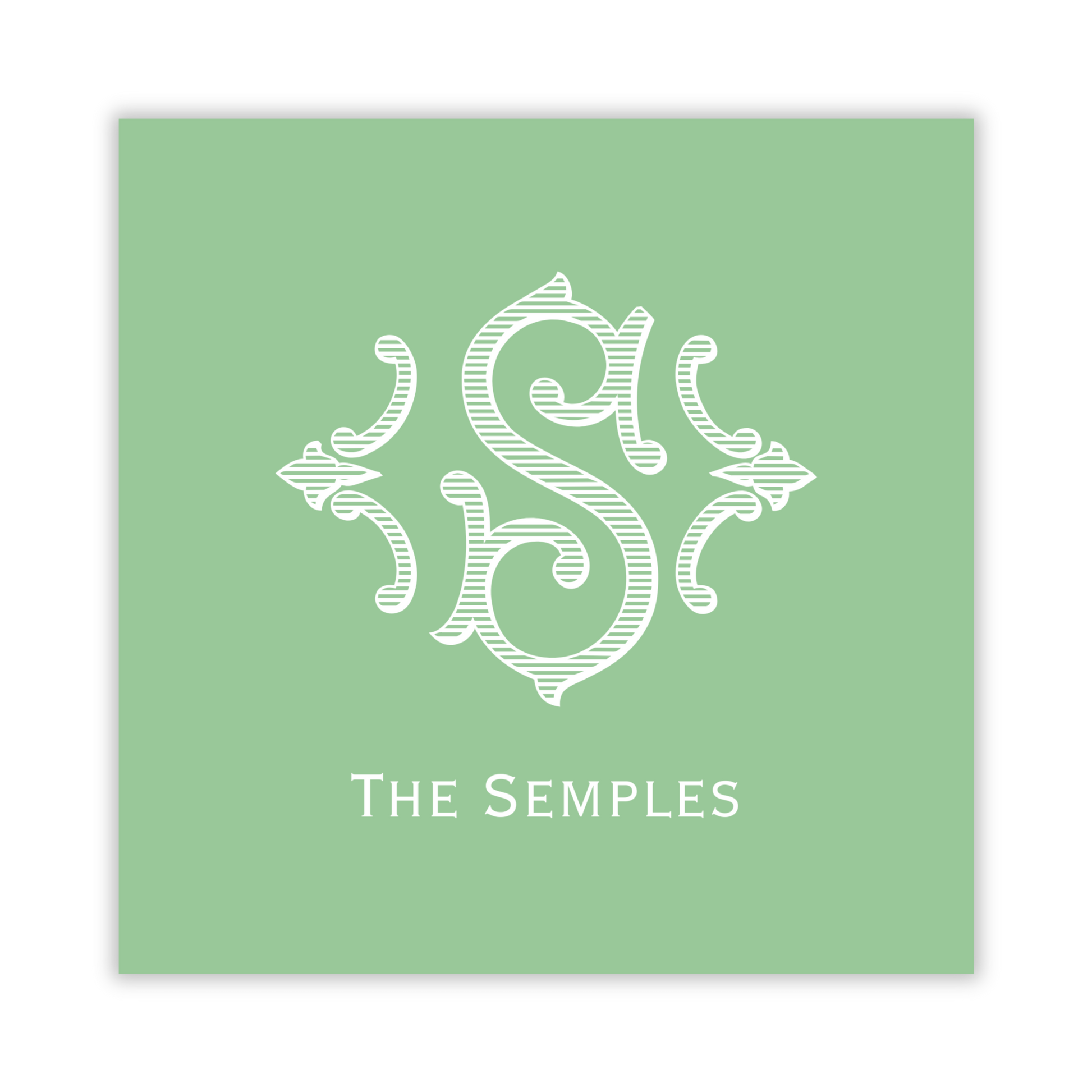 green gift tag with romanesque single initial; ShooFly Paper Co. Auburn, Alabama