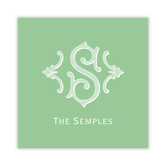 green gift tag with romanesque single initial; ShooFly Paper Co. Auburn, Alabama