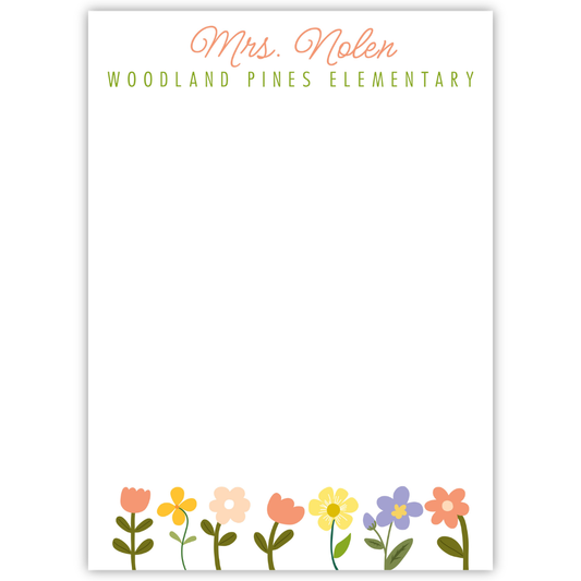 personalized notepad with colorful wildflowers along the bottom and a script name and block font school name at the top, ShooFly Paper Co. Auburn, Alabama